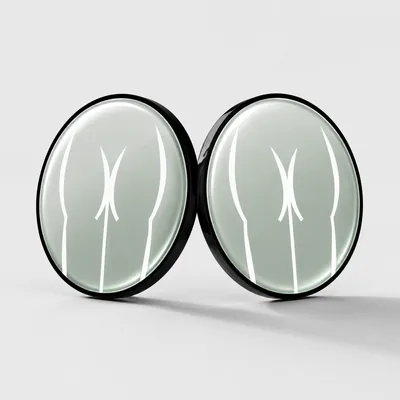 Two coins leaning against each other